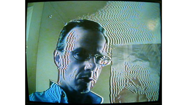 Self-portrait of James Schidlowsky through Vidiffektor circuit processing
